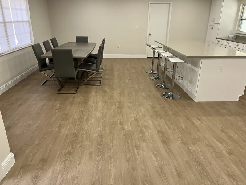 Open-concept living and dining space after a full renovation
